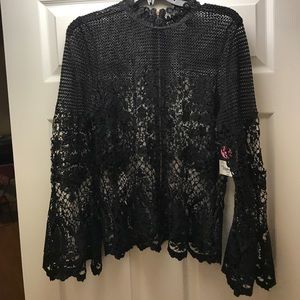 A lace long sleeve overlay shirt ..